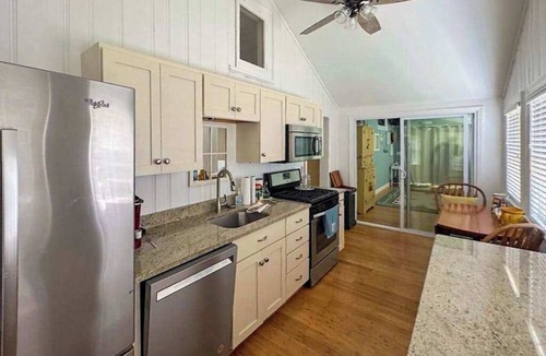 Pocasset House | Peaceful marshview escape with large sunroom, AC, outdoor firepit & dog friendly