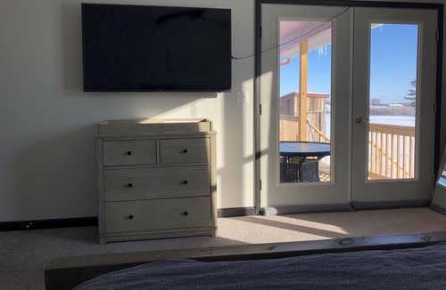 Keeseville House | Peaceful Master Bedroom with Hot Tub