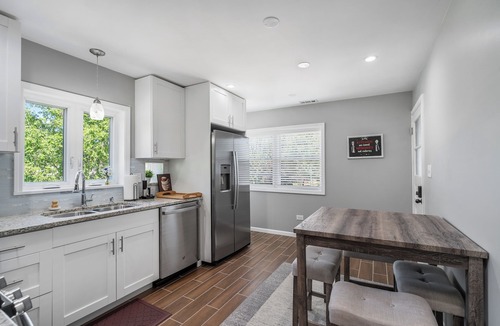 Belmont Cragin Apartment | Peaceful Oasis - Captivating Six-Bedroom Escape