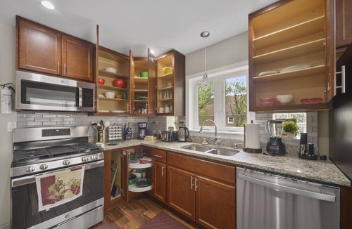 Belmont Cragin Apartment | Peaceful Oasis - Captivating Six-Bedroom Escape