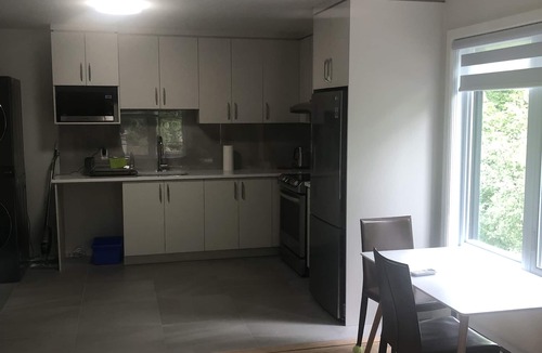 Pointe Claire Apartment | Peaceful oasis near airport private entrance.