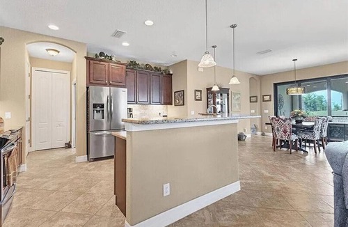 Long Meadow House | Peaceful Palms: 3 bedroom, 2 bath, heated pool, spacious lanai, golf course view