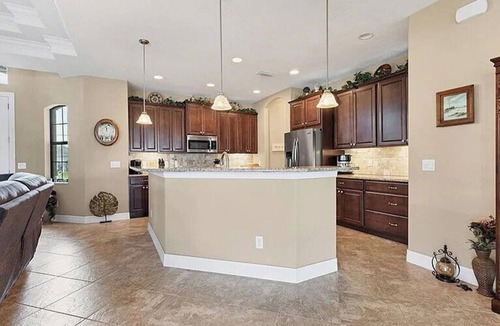 Long Meadow House | Peaceful Palms: 3 bedroom, 2 bath, heated pool, spacious lanai, golf course view