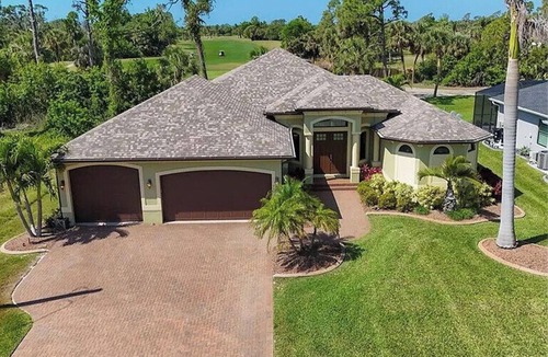 Long Meadow House | Peaceful Palms: 3 bedroom, 2 bath, heated pool, spacious lanai, golf course view