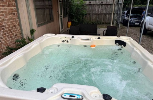 Clodine House | Peaceful Waters: Your Intimate Hot Tub Escape