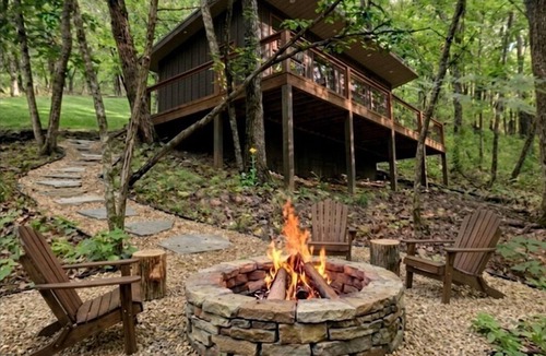 Pittsburg Cabin | Peaceful Wooded Getaway with Hot Tub, Fire Pit & Scenic Views in Pittsburg, Missouri