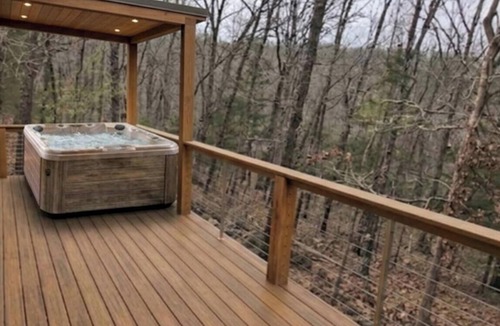 Pittsburg Cabin | Peaceful Wooded Getaway with Hot Tub, Fire Pit & Scenic Views in Pittsburg, Missouri