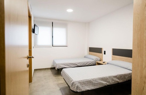 Caspe House | Pensión La Buena Vida