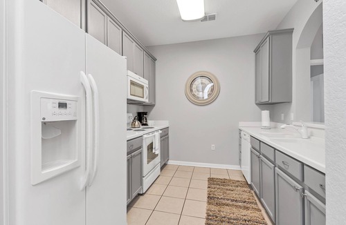 Florida Central Atlantic Coast Condo | Penthouse Condo w/Stunning View of Clubhouse and Lake Cay!