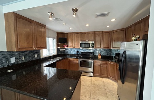 New Town Condo | Penthouse in Paradise!