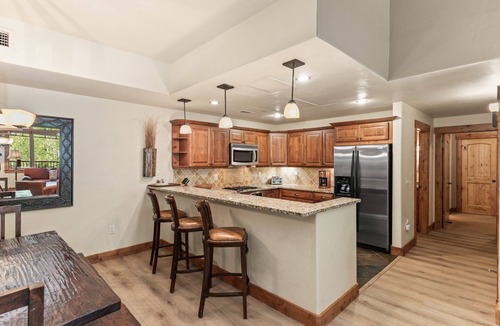 Steamboat Springs Condo | Penthouse Level + A/C! - Covered Deck, Outdoor Pool, Hot Tubs, Grill Area