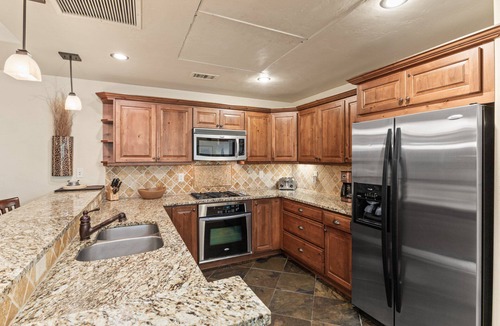 Steamboat Springs Condo | Penthouse Level + A/C! - Covered Deck, Outdoor Pool, Hot Tubs, Grill Area