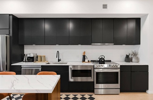 North Capitol Apartment | Penthouse River View Condo with Patio + Parking, Downtown