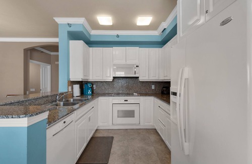 Navarre Beach Condo | PENTHOUSE - TOP FLOOR - BEACHFRONT & CHAIRS - POOL - BALCONY - GYM-NEW ELEVATORS