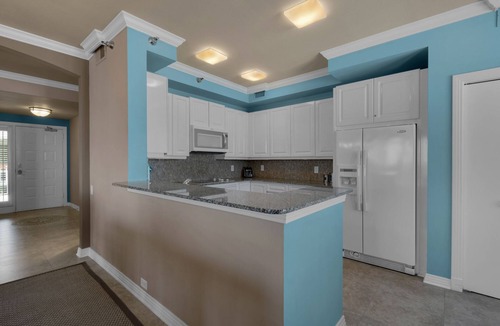 Navarre Beach Condo | PENTHOUSE - TOP FLOOR - BEACHFRONT & CHAIRS - POOL - BALCONY - GYM-NEW ELEVATORS