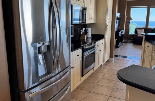 Thomas Drive Condo | PENTHOUSE VIEWS, WESTFACING UNIT BREATHTAKING SUNSETS