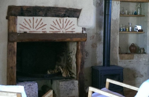 Prayssas House | Perched on the hillsides, stone house restored in the tradition