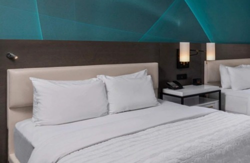 Central Business District Hotel | Perfect for Groups! 2 Pet-friendly Units, Rooftop Terrace, Bike Rental