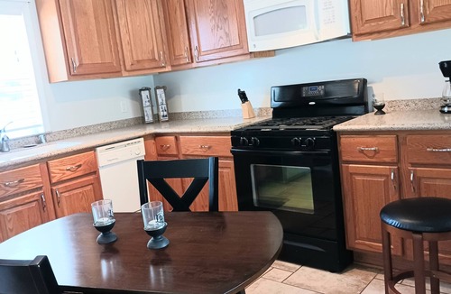Winthrop Harbor House | Perfectly Cozy! Close to so many places. Pet friendly. Great private backyard.