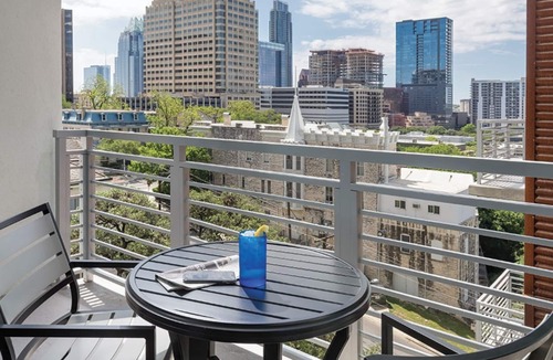 Civic District Apartment | Perfectly located Suite in Austin w/full kitchen, rooftop pool, fire pit, etc!