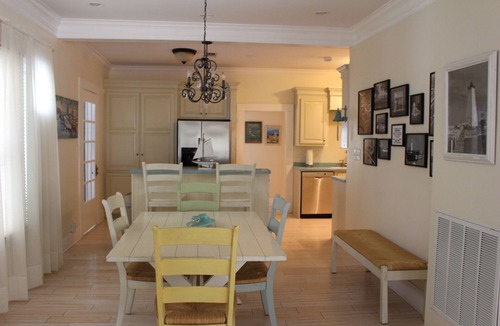 Gulfport House | Pet friendly cottage 1 block to beach fenced in yard with pergola & outdoor tub