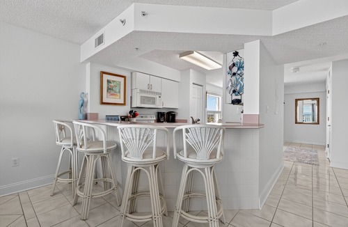 Seawinds Condo Condo | Pet friendly, direct oceanfront corner 2/2 with spacious balcony and heated beachfront pool