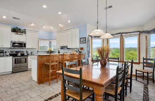 Whalehead Beach House | Pet friendly home! Elevator & amazing pool bar with TV, hot tub, deck views!