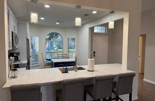 Wylie House | Pet Friendly Home with Relaxing Covered Patio and Private Backyard