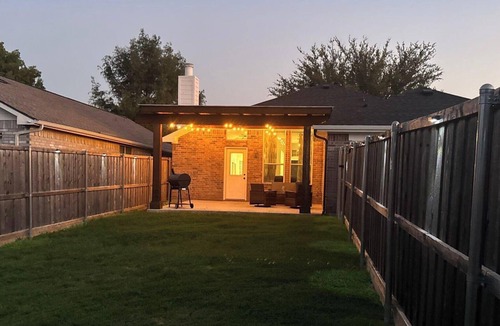 Wylie House | Pet Friendly Home with Relaxing Covered Patio and Private Backyard