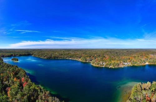 Michaywe House | Pet-friendly Lakefront Home w/Dock & Grill!
