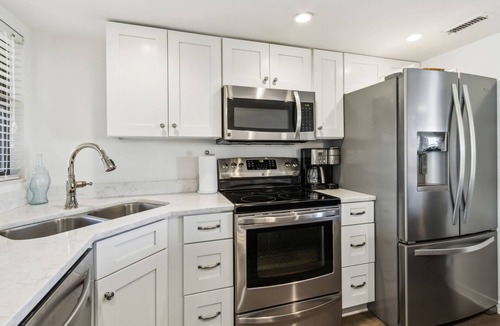 Amelia City Condo | Pet Friendly Oceanfront Sailmaker Condo | Ground Floor | Updated Kitchen | Steps to the Beach