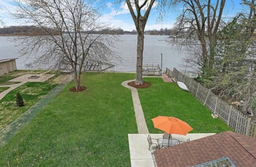 Fox Lake House | Pet Friendly Sunset Lakefront Cottage in Fox Lake w/Boat Pier