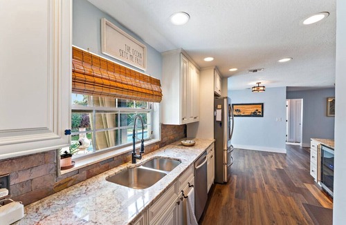 North Palm Beach House | Pet Friendly w/Heated Pool 4BR Home