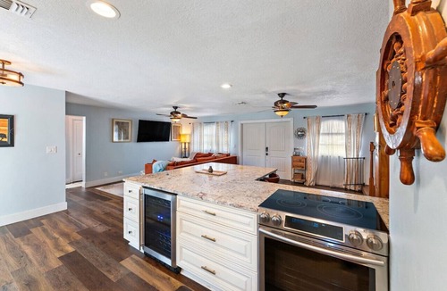 North Palm Beach House | Pet Friendly w/Heated Pool 4BR Home