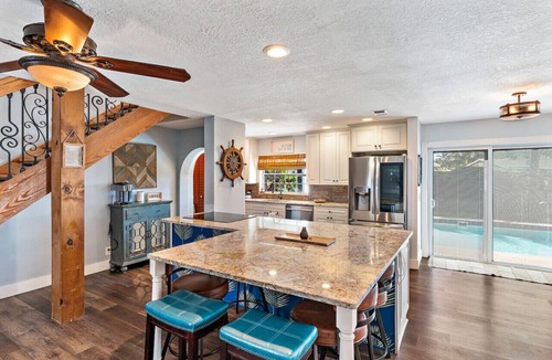 North Palm Beach House | Pet Friendly w/Heated Pool 4BR Home