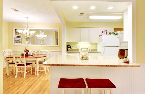 Demere Park Condo | Pet Friendly Walk to Pier Village & Beach Heated Pool Sleeps 6
