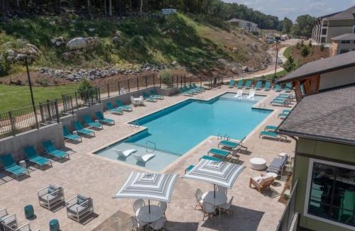 Pelham Apartment | PetFriendly Getaway with Pool and Gym