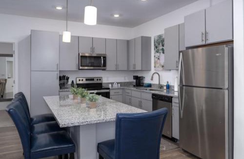 Pelham Apartment | PetFriendly Getaway with Pool and Gym
