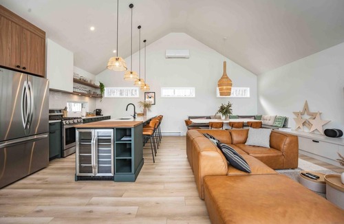 Petite-Riviere-Saint-Francois Ski Chalet | Phil Good 1219: River Views, Hot Tub & Scenic Path