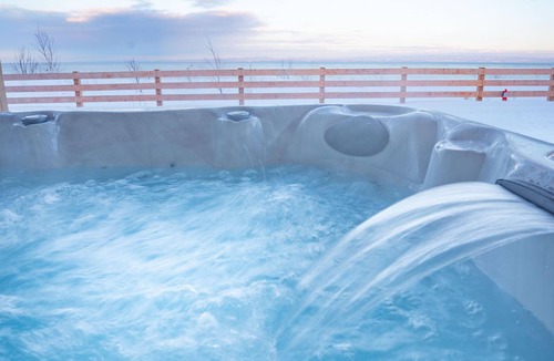 Petite-Riviere-Saint-Francois Ski Chalet | Phil Good 1219: River Views, Hot Tub & Scenic Path