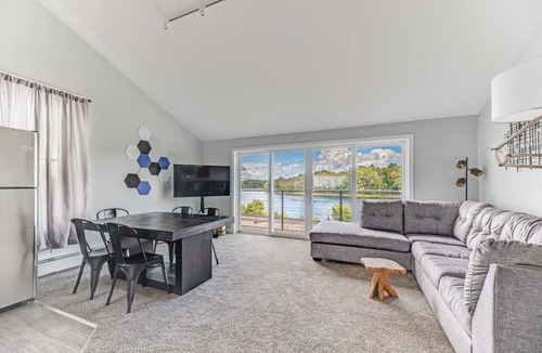 Costigan Apartment | Picturesque Riverfront | 4 BD | Parking Provided