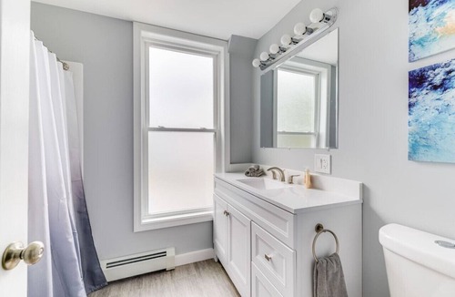 Costigan Apartment | Picturesque Riverfront | 4 BD | Parking Provided