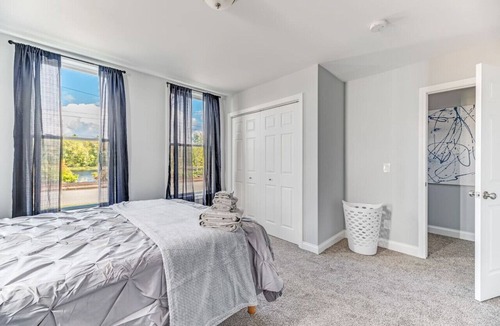 Costigan Apartment | Picturesque Riverfront | 4 BD | Parking Provided