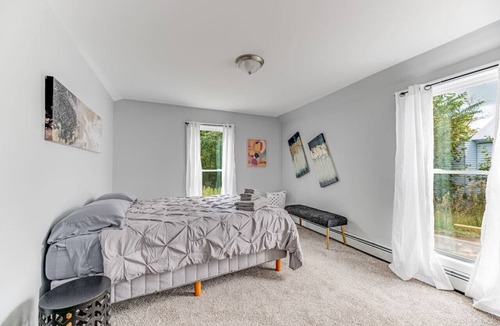 Costigan Apartment | Picturesque Riverfront | 4 BD | Parking Provided