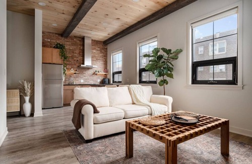 Irving Park Apartment | Pine Beam Sloth Apartment next to Blue Line