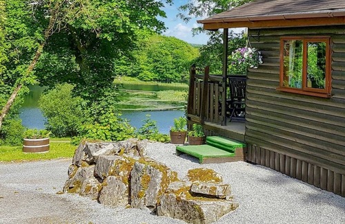 Porthyrhyd Ski Chalet | Pine log lodge with one double and one with bunks and a single.