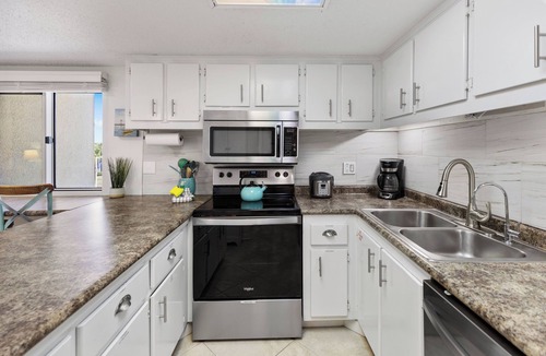 Laguna Beach Estates Condo | Pinnacle Port with Gulf & Lake Views | Pools | West End PCB
