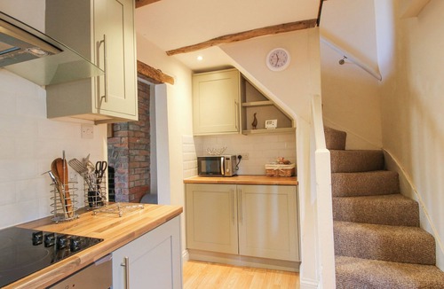 Knighton Cottage | PINNER'S COTTAGE, with open fire in Knighton