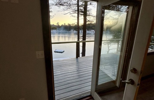 Brantingham House | Pleasant Lake House with private docks and large decks!