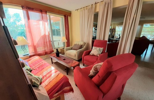 Lake Worth Corridor House | Plumaria Room with private bathroom on shared lakeview House